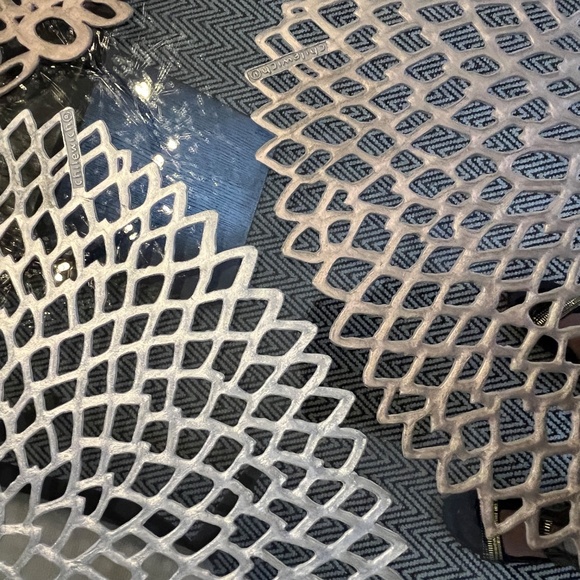 Chilewich place setting, laser-cut, perforated, organic shapes, in silver. - Picture 7 of 16